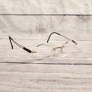 Silhouette Titan Rimless Eyeglasses Gold Brown Oval 7661 20 6052 Austria 140mm